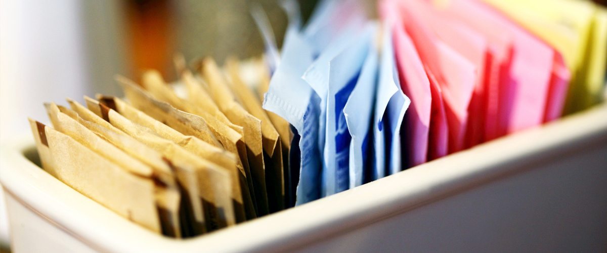 An assortment of artificial sweetener packets
