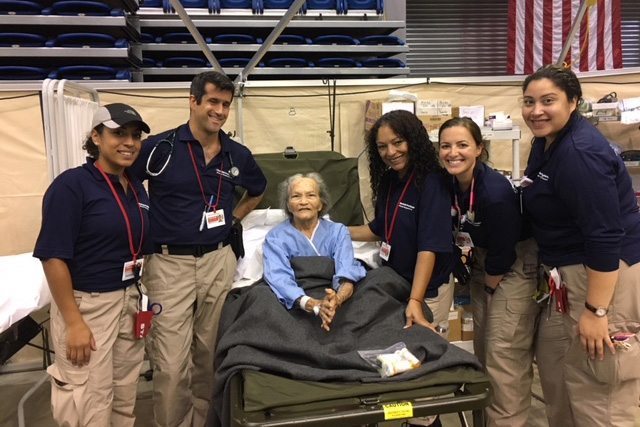 Portrait of healthcare providers with a patient