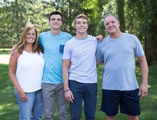 Portrait of Amazing Patients Mike and Steve Brown with their parents