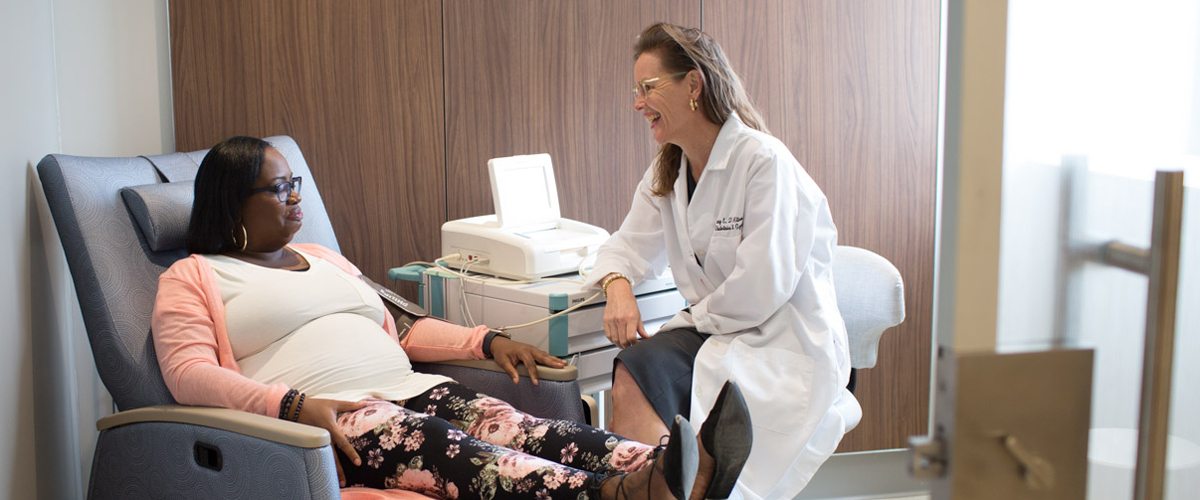 A portrait of Dr. Kirsten Lawrence Cleary and patient Ebony Boyd