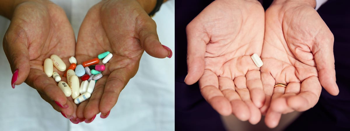 Two pair of hands holding assorted pills