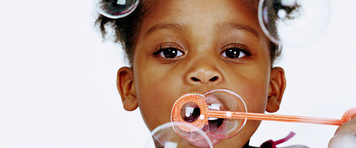 A child blowing bubbles