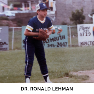 Dr. Ronald Lehman playing baseball as a child