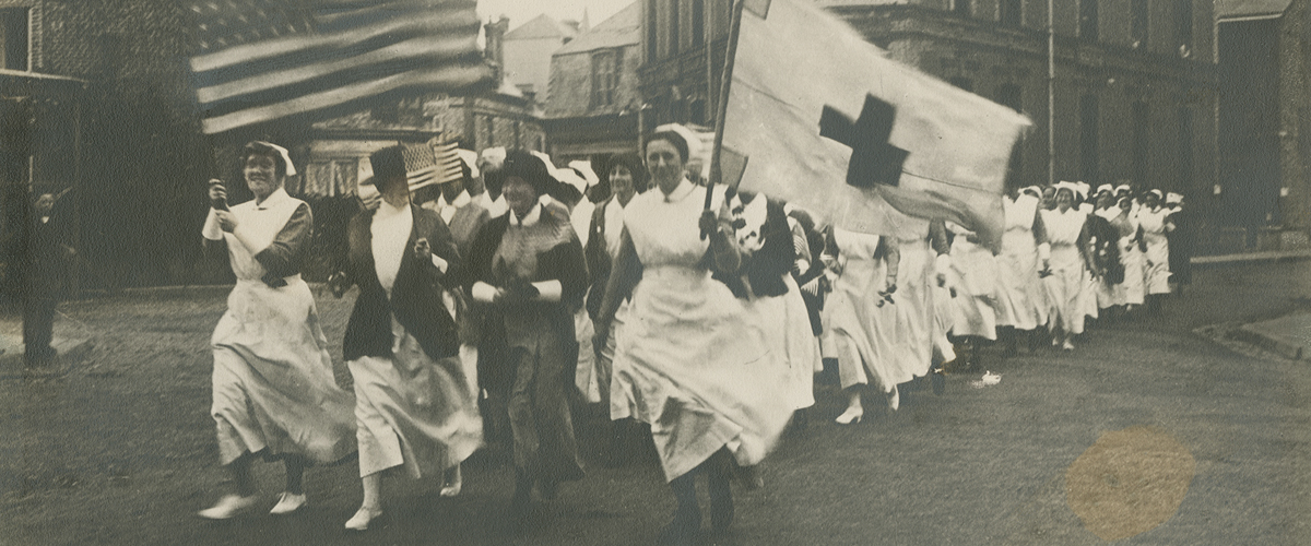 1918 photograph of a parade of Base Hospital No. 2 nurses escorting Anna Maxwell.