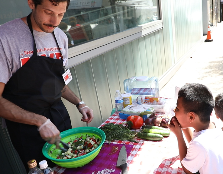 Cooking demo at the mobile food market