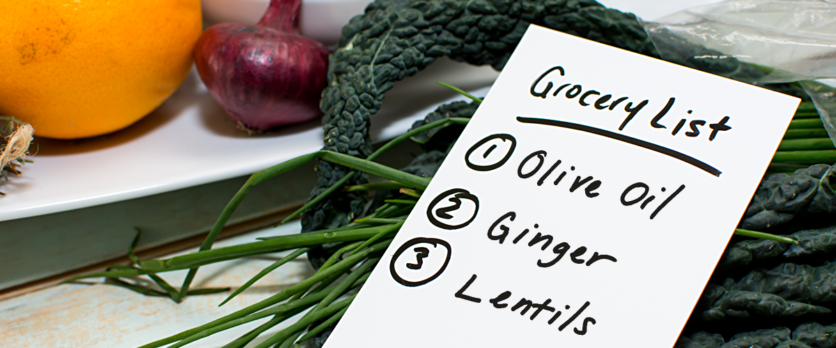 Grocery list listing olive oil, ginger, and lentils–3 doctor-approved kitchen staples.
