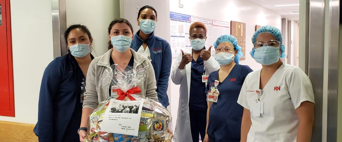 Group of NYP nurses on the front lines with a gift basket.