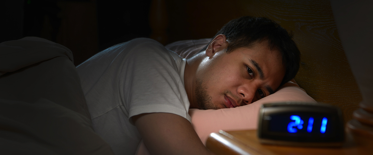 man can't sleep during the COVID-19 pandemic