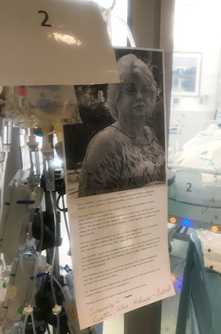 A photo of a woman with text about her next to her bedside