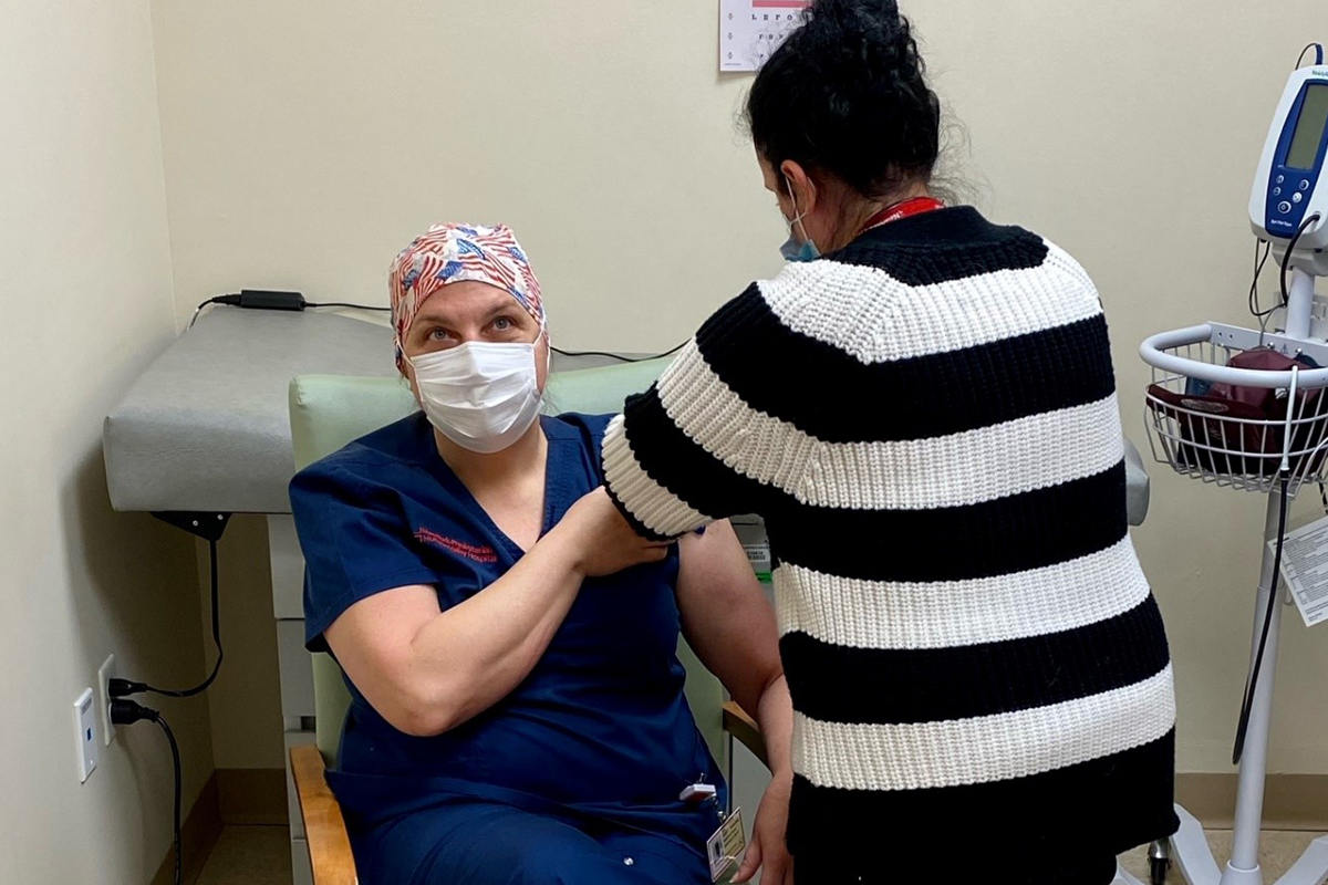 NYP staffer gets COVID-19 vaccine