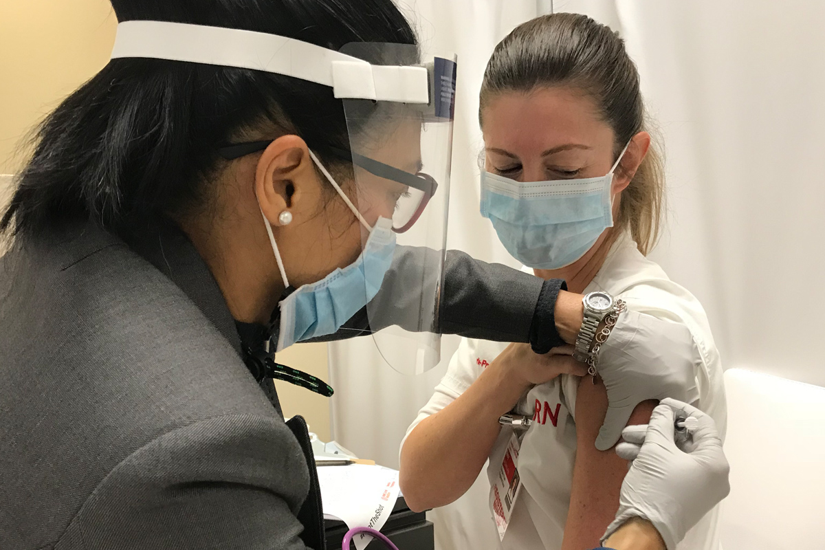 NYP staffer gets COVID-19 vaccine