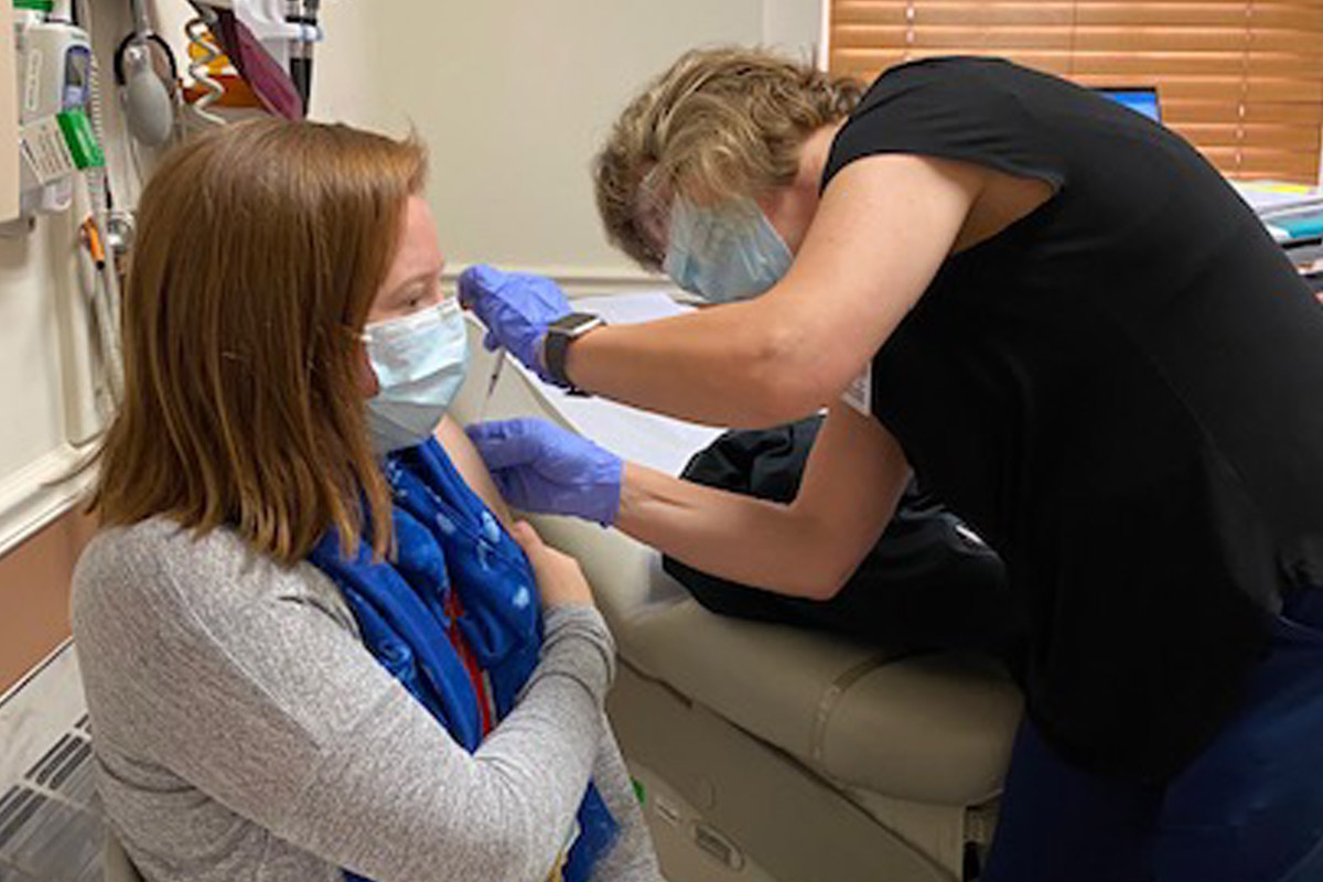 NYP staffer gets COVID-19 vaccine