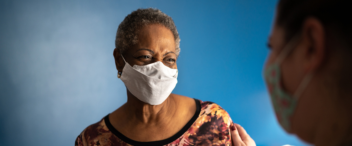 black woman seeing doctor about colorectal health